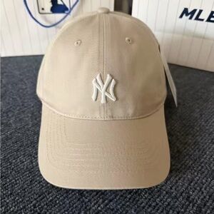 Light brown baseball cap